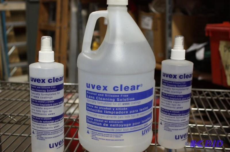 lot 184 image: Lot of (3) Uvex Clear Lens Solution, 1 Gallon Jug & 2 16 oz. Sprayer Bottle wSpray Cap S463.