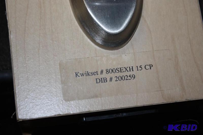 lot 23 image: Brass Colored Door Handle Set Kwikset #800SEXH 15 CP Includes Key.