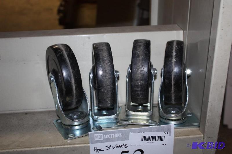 lot 53 image: Lot of (4) 5 Plastic Wheels w Attached Metal Frame Bracket.