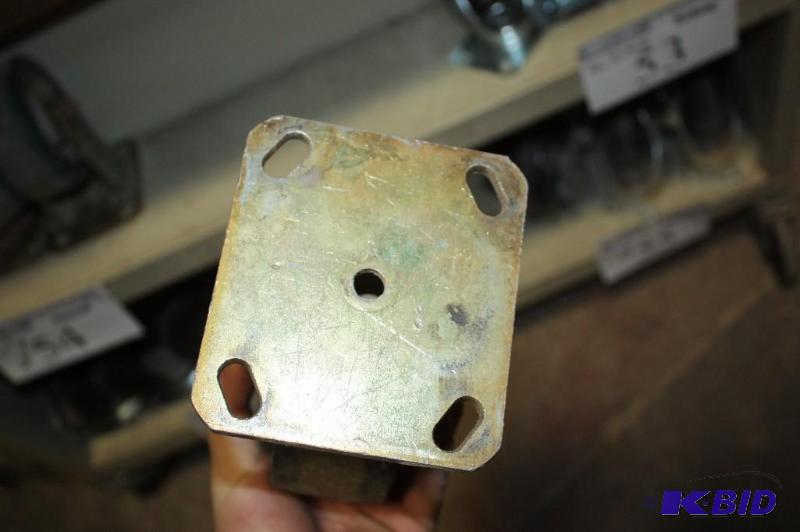 lot 54 image: Lot of (4) 5 Nylon Wheels w Attached Metal Frame Bracket.