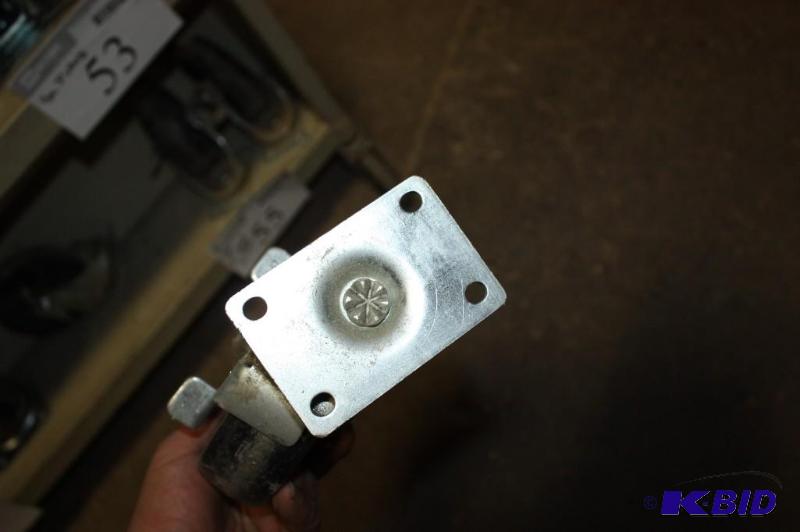 lot 55 image: Lot of (4) 4 Plastic Wheels wStop Locks & Attached Metal Frame Bracket.