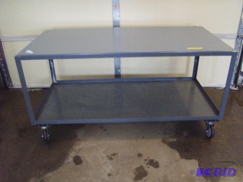 lot 14 image: Metal Table 60" wide x 30" deep x ...