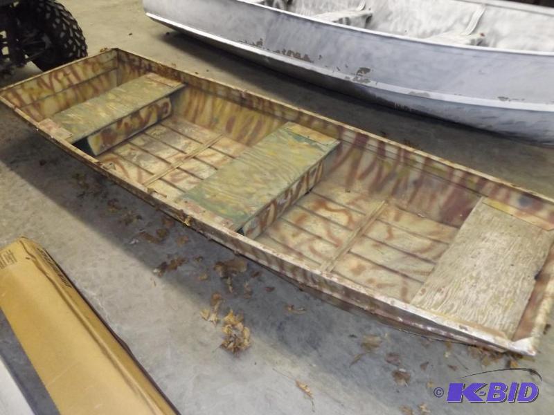 10  1980 Duckboat, spray painted camo-like.&...