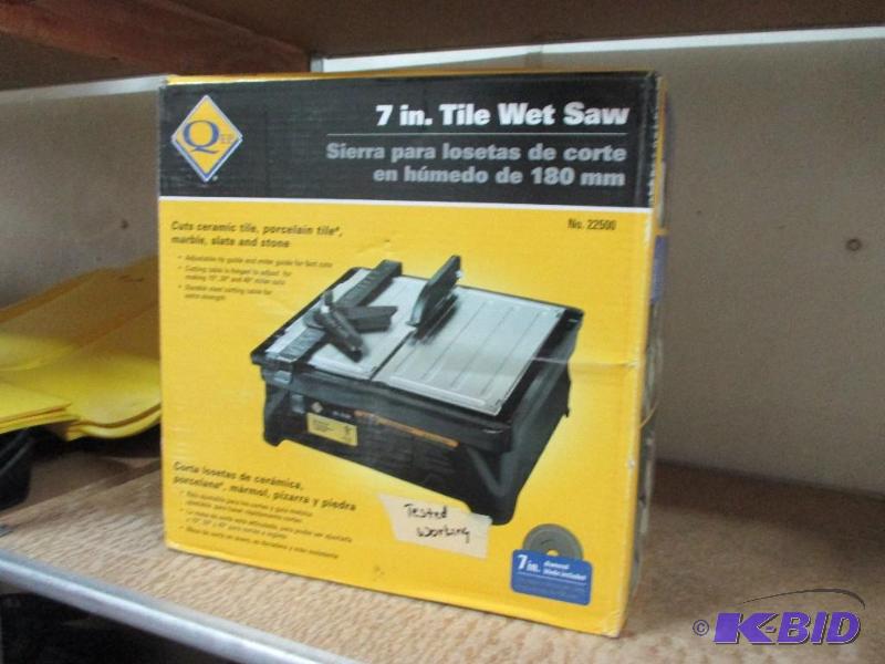 lot 64 image: 7" tile saw, tested and works...