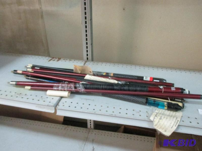 lot 94 image: Pool cues...