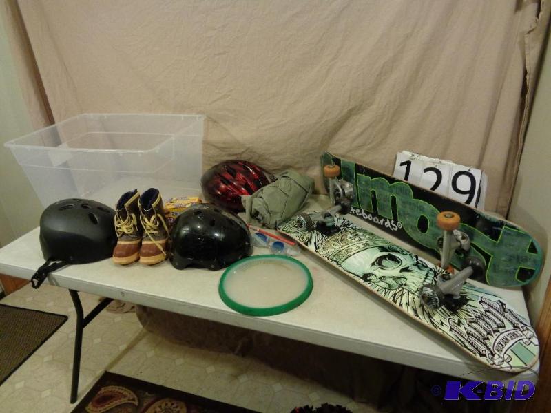 lot 129 image: Skateboard Helmets, 2 Skateboards, Raincoat, ...