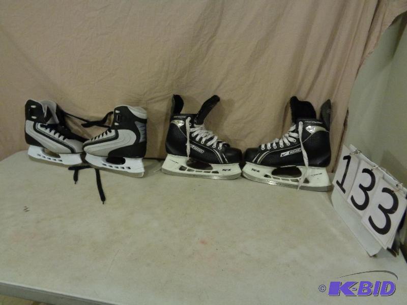 lot 133 image: 2 pairs of hockey skates. Bauer One05 Supreme...