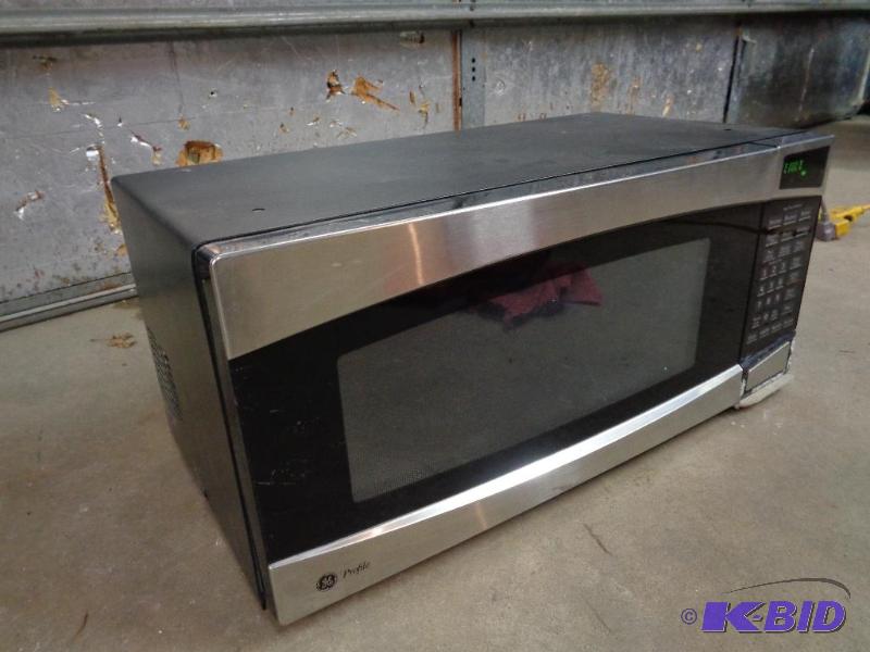 lot 1G image: GE Profile Stainless Steel Microwave. Model P...