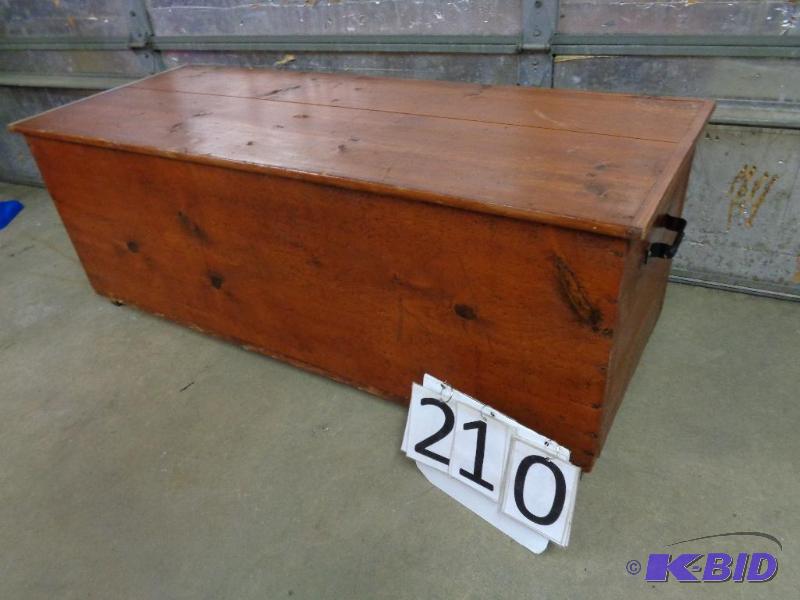 lot 210 image: Nice Large Wood Hope Chest On Wheels. Measure...