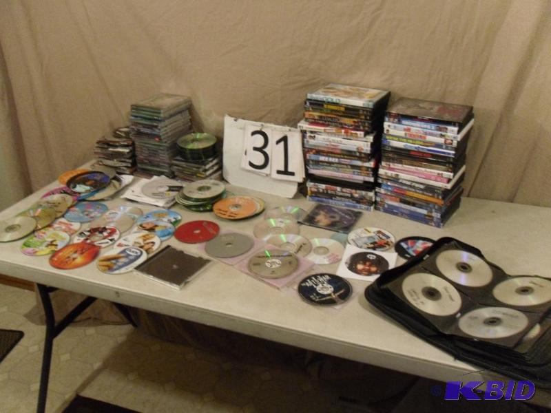 lot 31 image: Large Lot of Assorted DVDs, Computer Games, &...