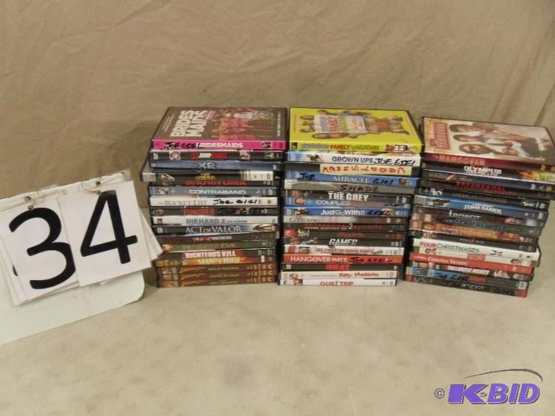 lot 34 image: Lot of 50 Assorted DVDs. Untested. Some may n...