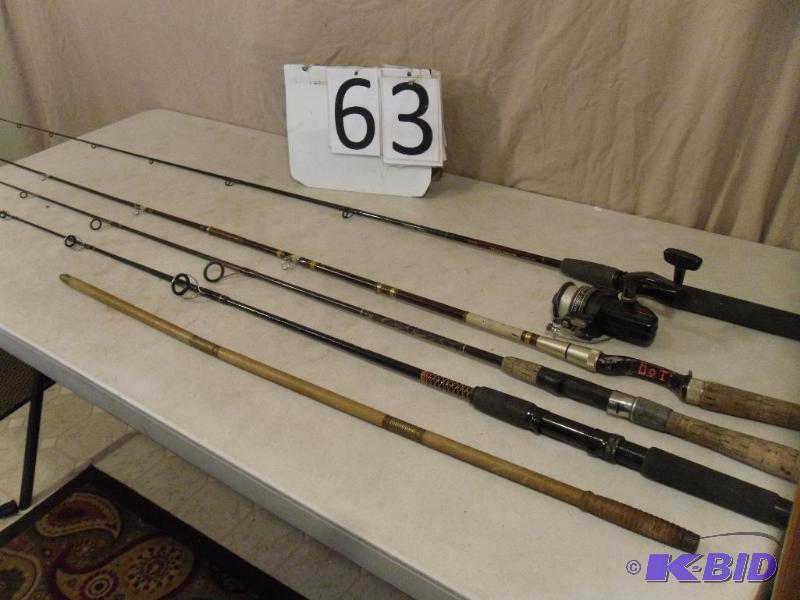 lot 63 image: Lot of 4 Fishing Rods, 1 Reel, and More. Daiw...