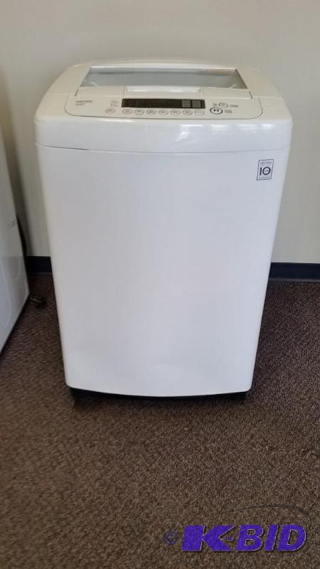 LG Electronics 3.6 cu. ft. High Efficiency Front Control Top Load Washer Scratch N Dent.