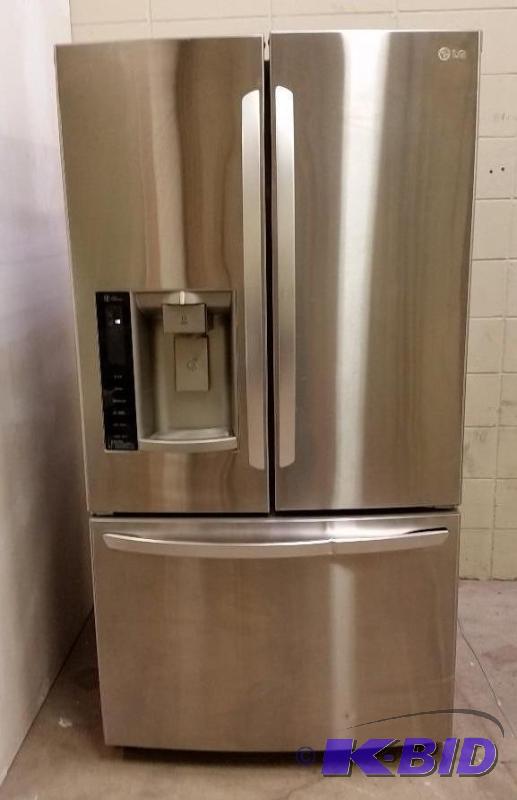 26.8 cu. ft.  French Door LG Refrigerator in Stainless Steel.  Scratch N Dent  See Pics
