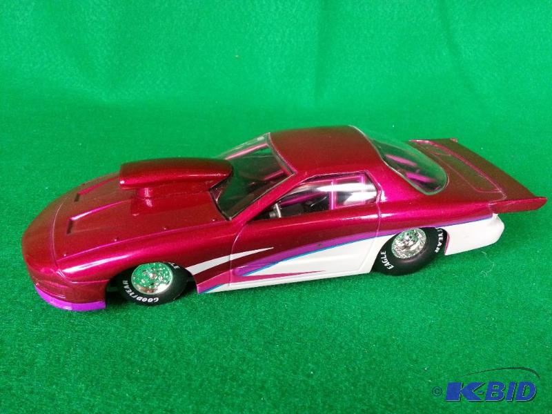 lot 101 image: Racing Champions Pontiac Firebird Funny Car 124 Scale