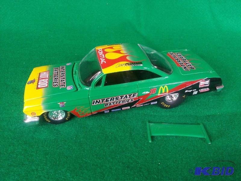 lot 122 image: Interstate Batteries #9 NASCAR 124 Scale  Th...