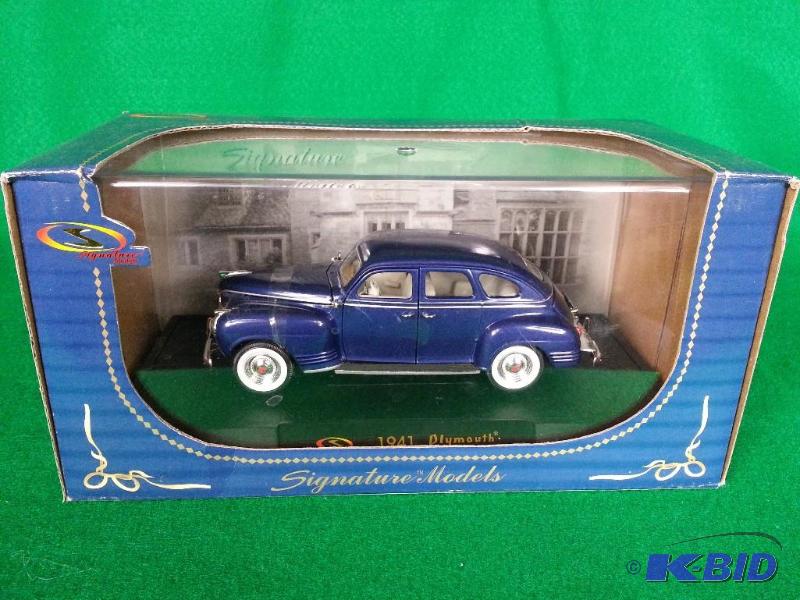 lot 57 image: Signature 1941 Plymouth