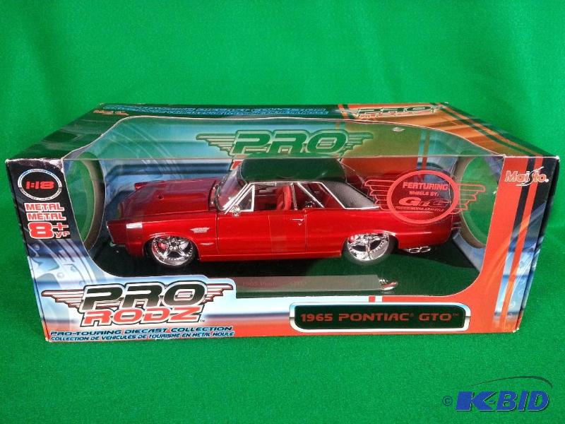 lot 7 image: Maisto 1965 Pontiac GTO 118 Scale