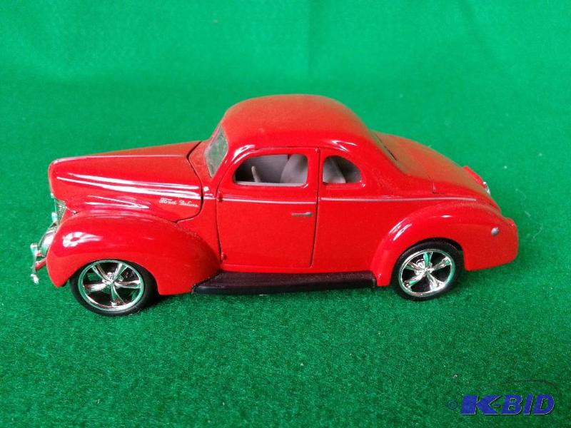 lot 99 image: Ford 5-Window Coupe 134 Scale