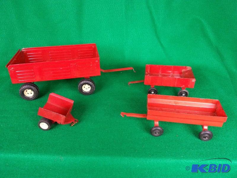 lot 32 image: Lot of (4) Vintage Tractor Wagons