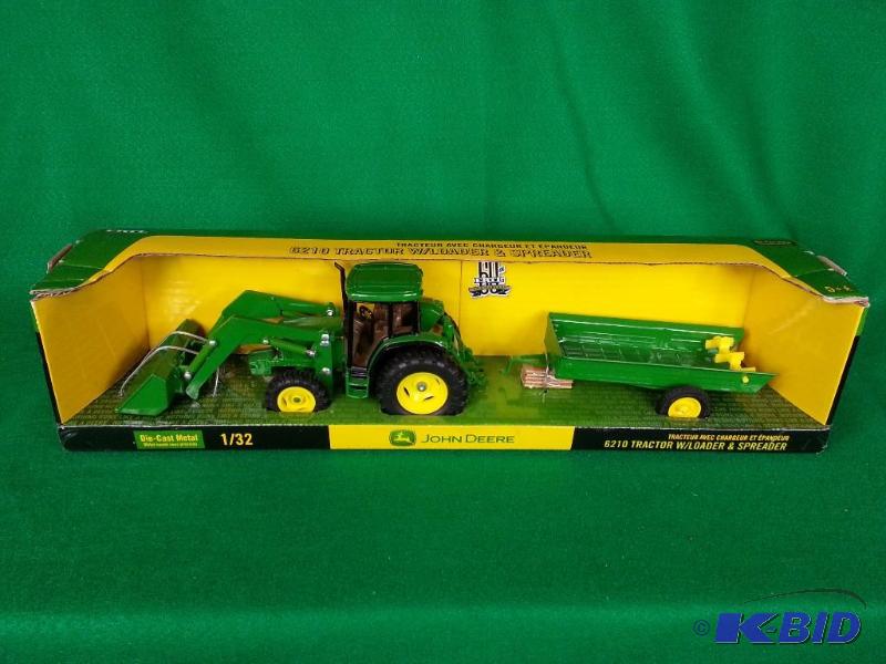 lot 38 image: Ertl John Deere 6210 Tractor w Loader and Spreader 132 Scale