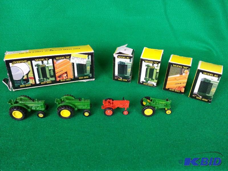 lot 49 image: John Deere Historical (4) Piece Tractor Ser