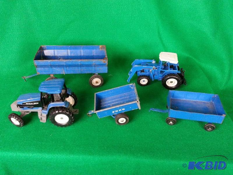 lot 72 image: Lot of (5) Ertl Tractors & Implements  Ford 8630, New Holland 8670, and Wagons (one is a Ford)