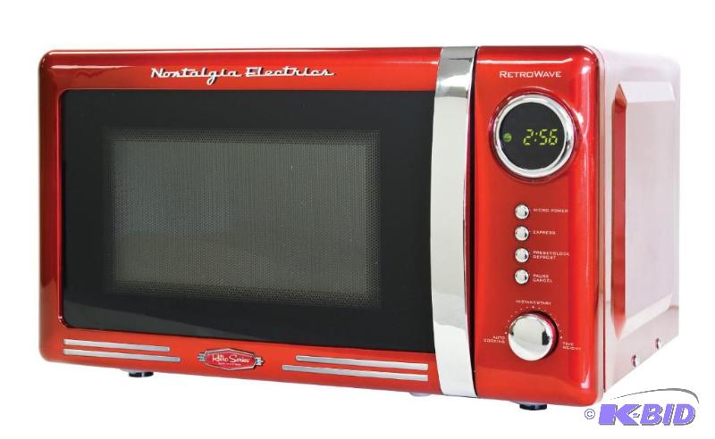 lot 110 image: Nostalgia Electrics RMO770RED Retro Series Countertop Microwave Oven