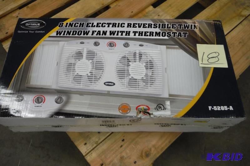 lot 18 image: Optimus Resersable Twin Window Fan W Thermostat
