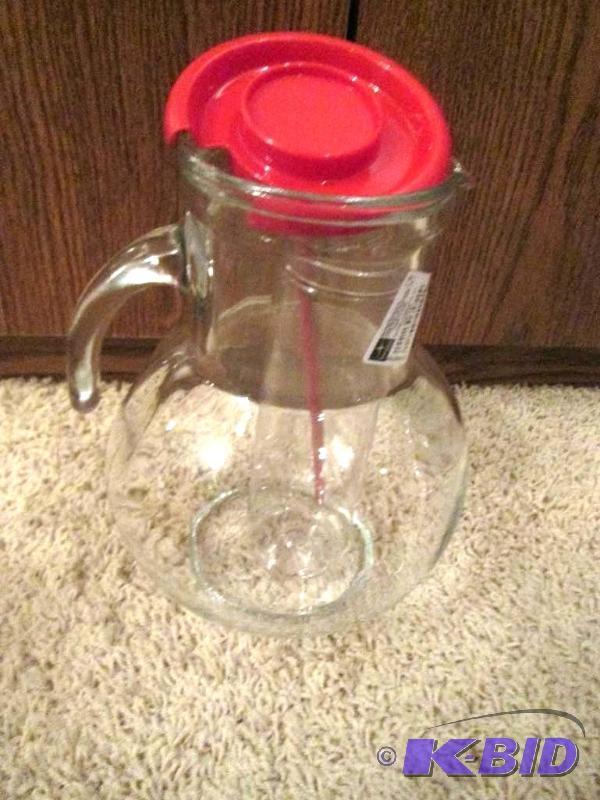 lot 81 image: Glass jug with plastic lid,...