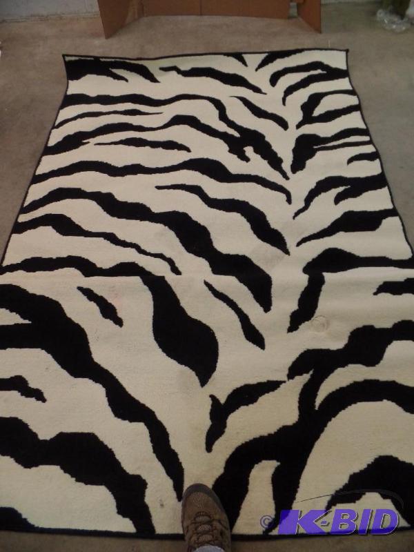 lot 42 image: Zebra Print Area Rug 93 x 63