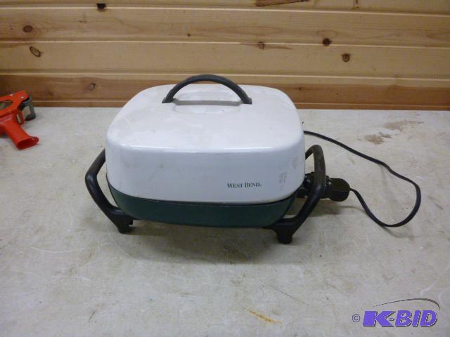 lot 152 image: Electric West Bend Frying Pan Broken base....