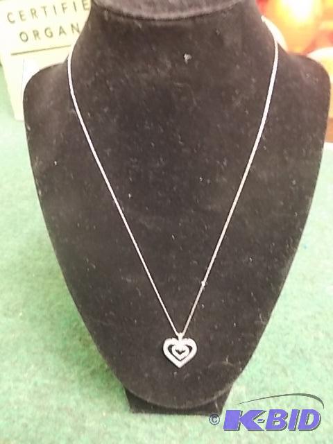 White Gold Heart Pendant with Diamonds...