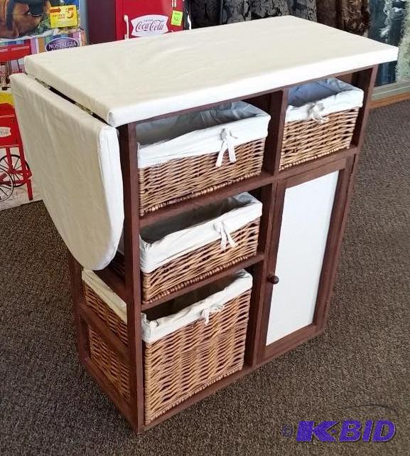 Ironing Board with Storage.  New out of Box.  Assembled.  Comes with wheels.  Included not attached.