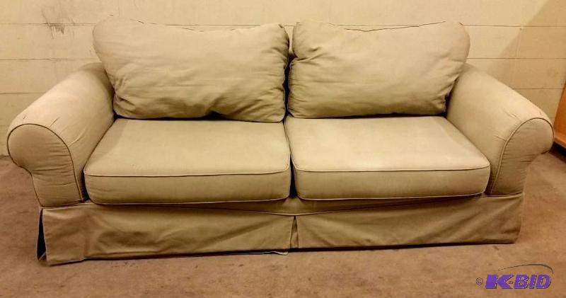 Cream Colored Canvas Fabric Full Size Couch.  Gently Used Shows a little wear.