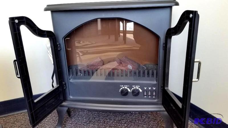 Randall Electric Stove Heater.  New out of Box.  Heats very well.  Adds Elegance to your room.