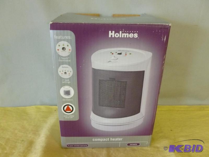 lot 111 image: Holmes compact ceramic heater, like new in th...