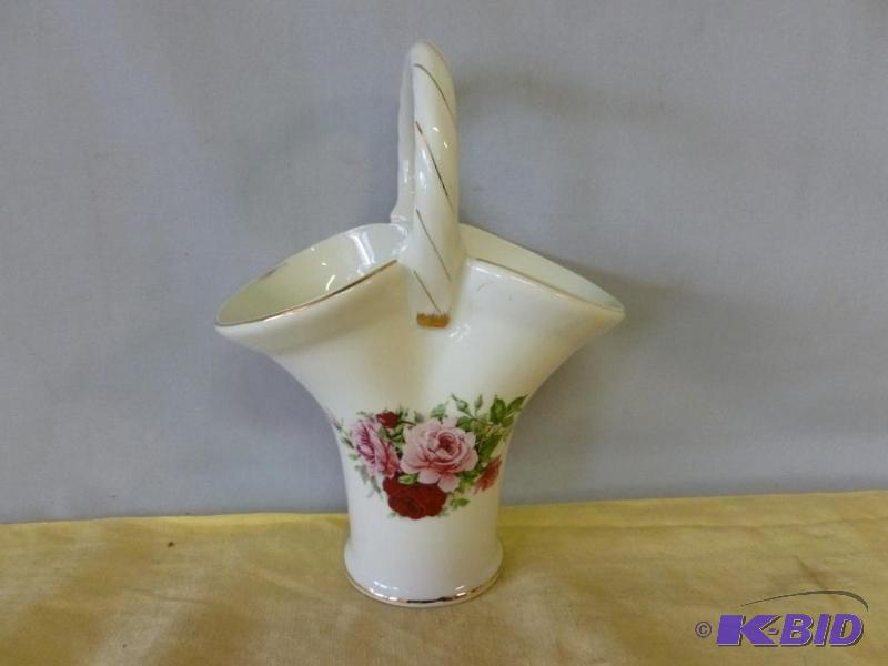 lot 116 image: Beautiful handled porcelain basket that measu...