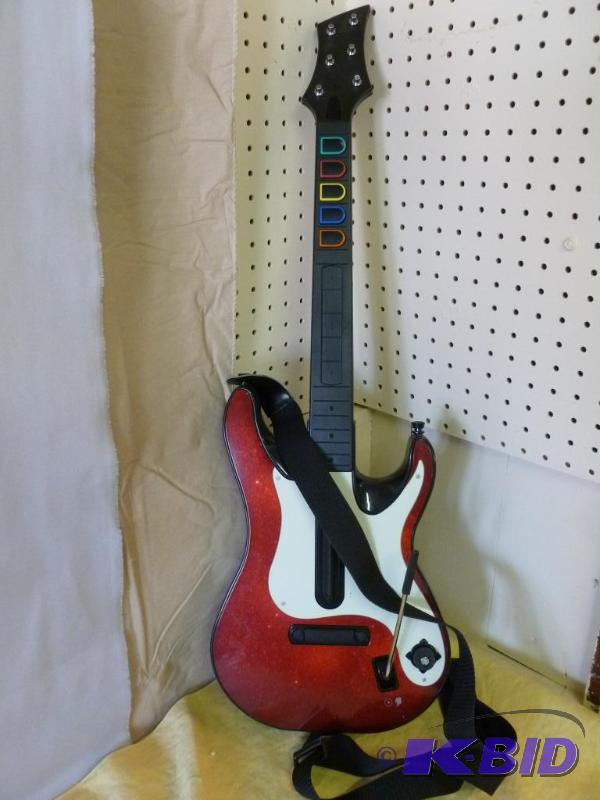 lot 13 image: X-Box Guitar Hero - Guitar, seller said that ...