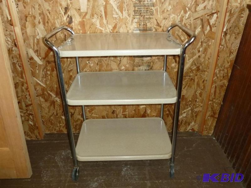 lot 134 image: Vintage Cosco three tiered metal rolling cart...