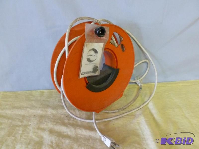 lot 135 image: Cordwheel with a length of extension cord....