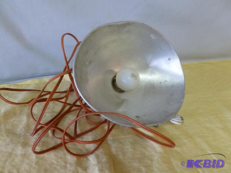 lot 138 image: Large clamp on light with long cord....