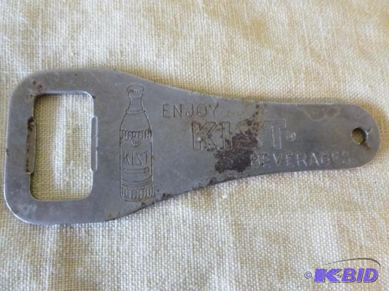lot 150 image: Vintage Kist metal bottle opener, measures 4&...