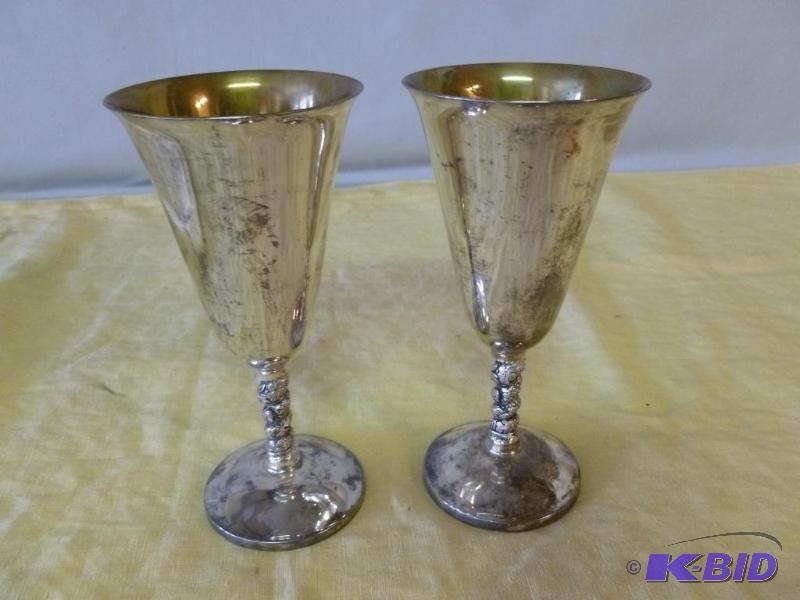lot 173 image: A pair of vintage silver plate wine chalice c...