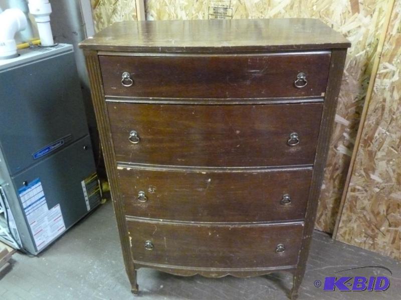 lot 230 image: Vintage four drawer wooden dresser that measu...