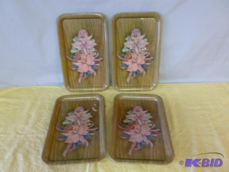 lot 59 image: A set of four vintage metal serving trays tha...