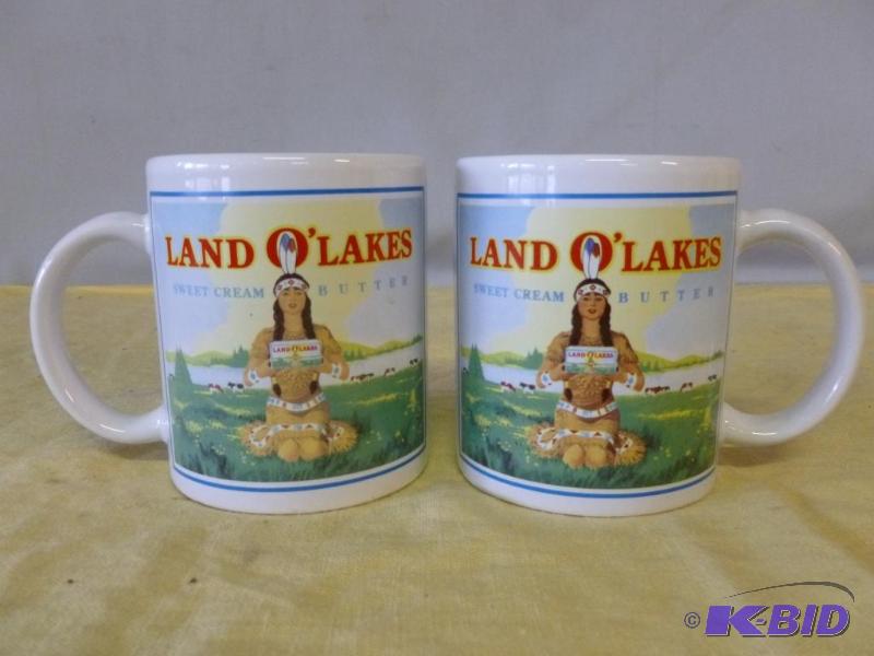 lot 61 image: Lot of two collectible Land O Lakes mugs....