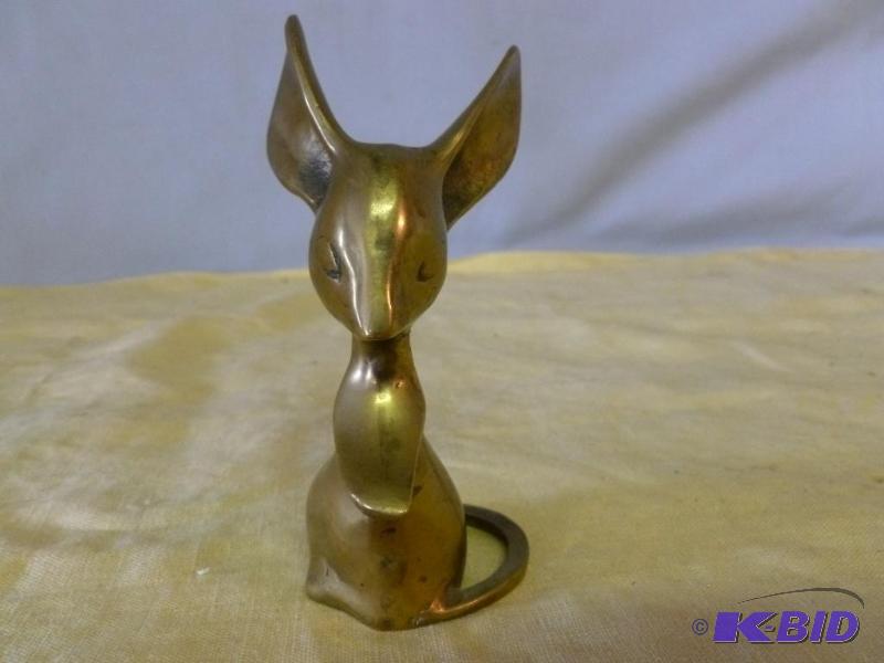 lot 79 image: Cast brass figurine that measures 2" acr...
