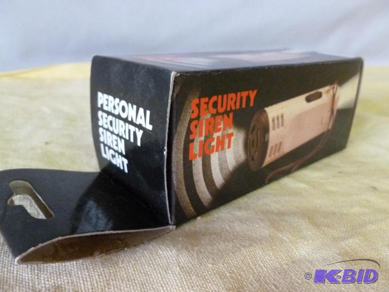 lot 96 image: Security siren light, new in the box. ...