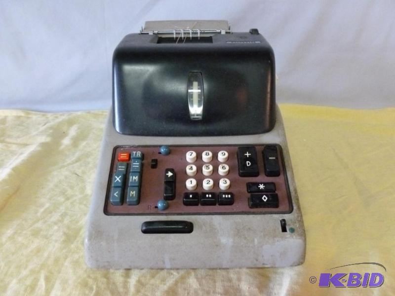 lot 97 image: Olivette electric adding machine....